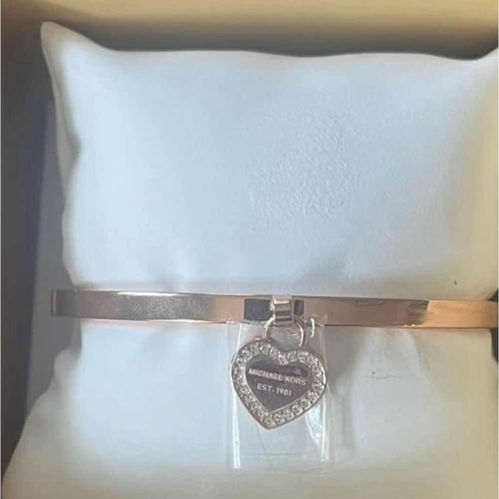 Michael Kors gold bracelet, new in box.